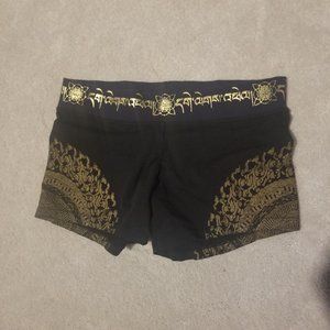 Size Small, color black, gold imprint with navy waist band